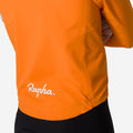 RAPHA CORE Regenjacke III - BRIGHT ORANGE/Weiß