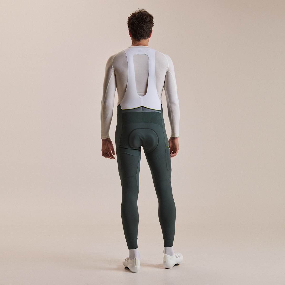 RAPHA Brevet Cargo Winter Tights Dark Forest/Chartreuse - on model