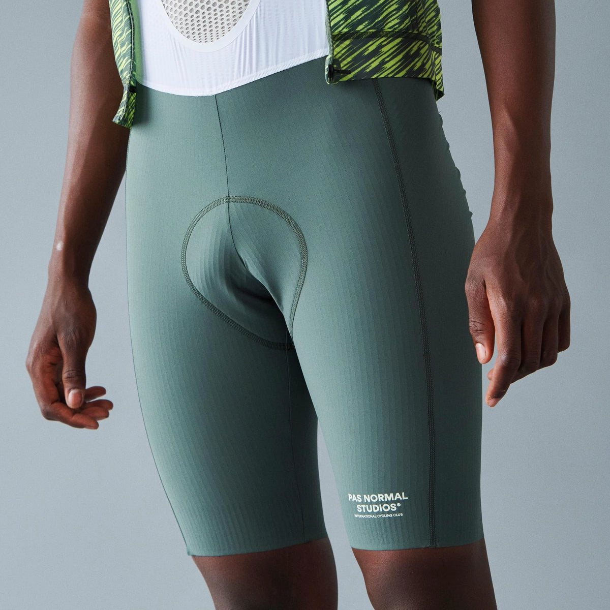 PAS NORMAL STUDIOS Solitude Bib Shorts SS24 - Dark Moss – Velodrom CC