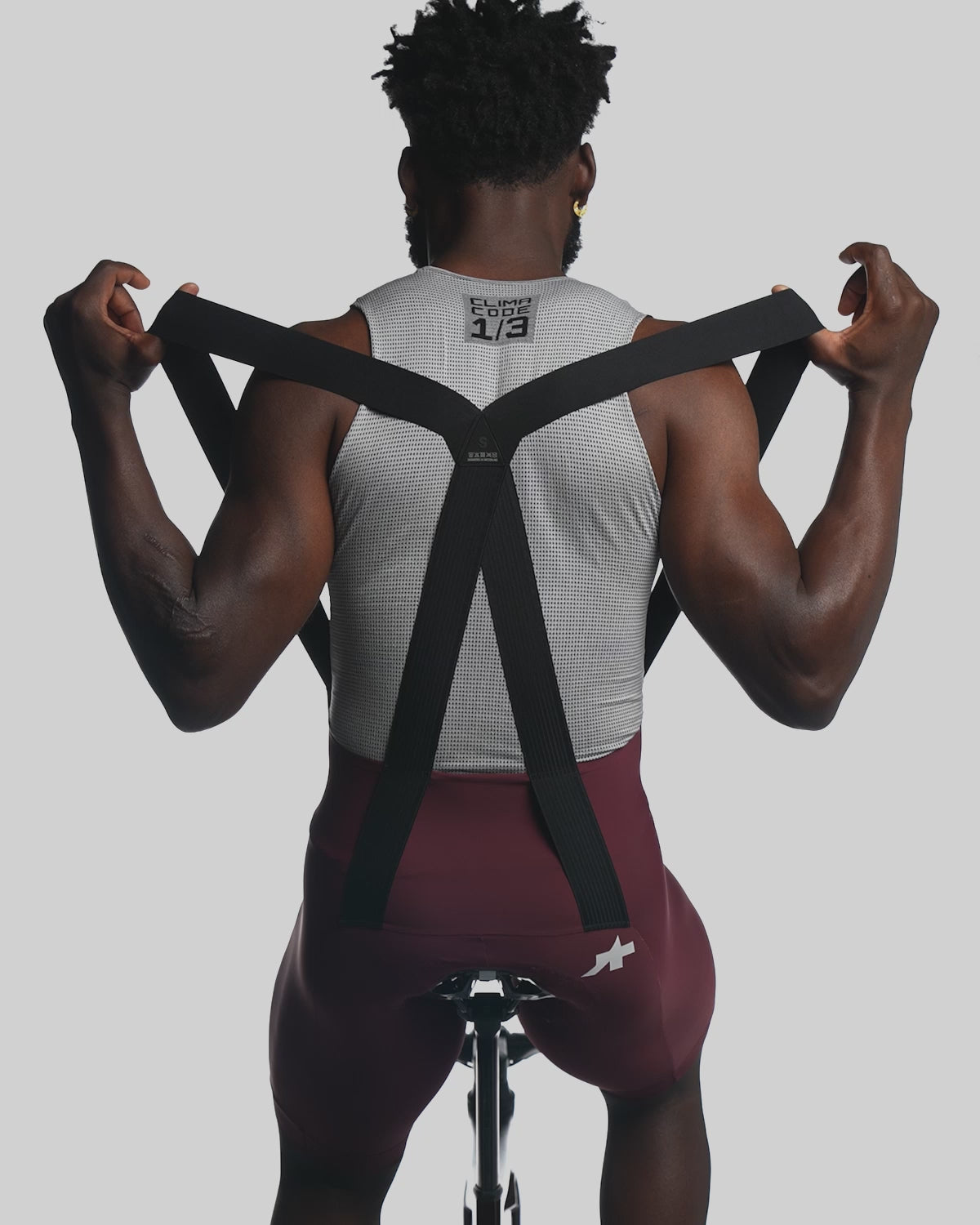 ASSOS Mille GT Bib Shorts Burgundy Red product video