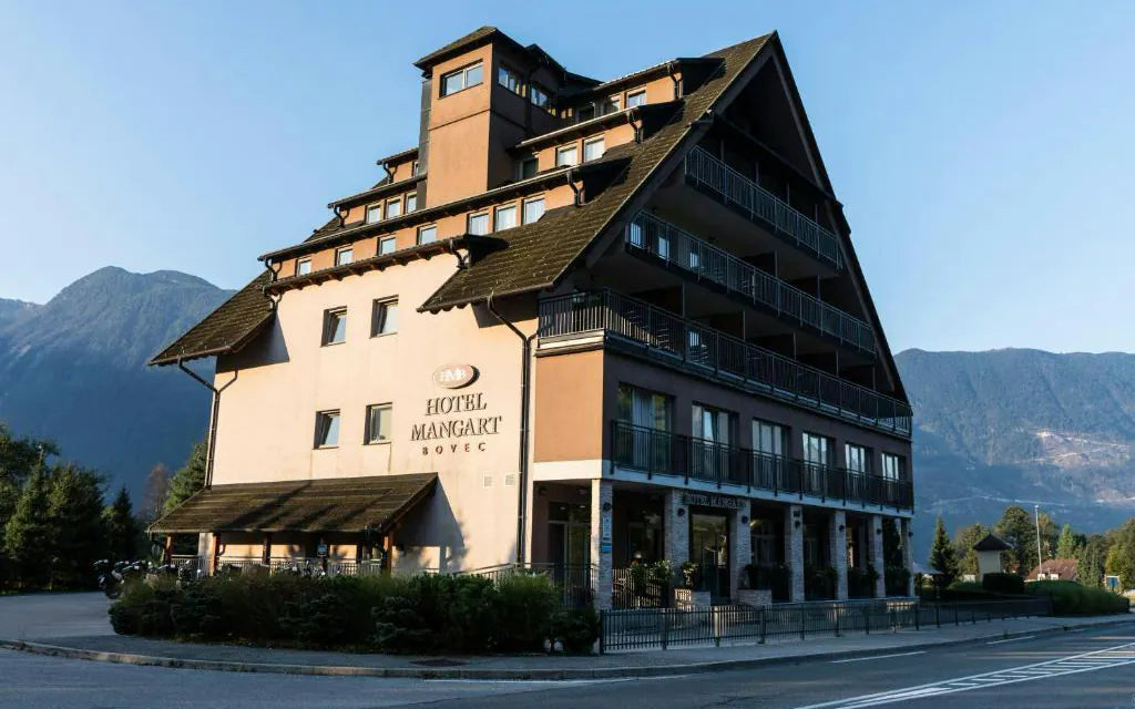 Hotel Mangart in Bovec with the mountains behind